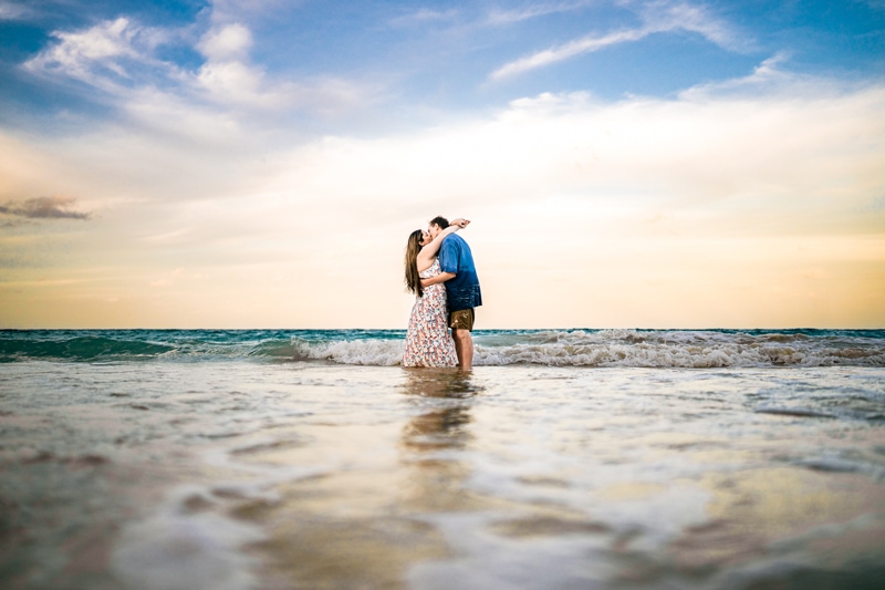 Lightened and Edited Image Preset - man and woman embrace in ocean waters 