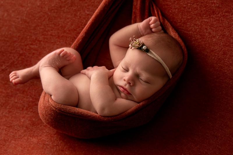 Moor Preset Pack, a baby lays sleeping swaddled in a blanket